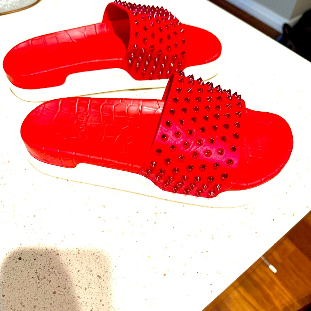 Christina Louboutin sandals hardly worn. Too small. Guaranteed authentic